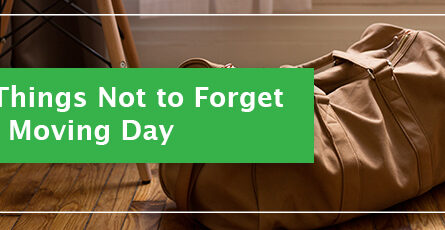 A duffel bag laying down on a wood floor. A green box with white text is off to the left displaying "5 Things Not to Forget on Moving Day"