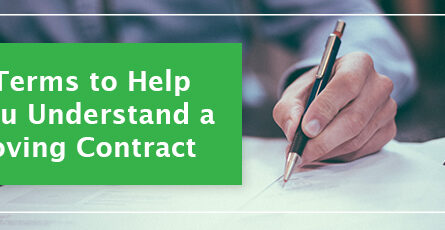 A hand holding a pen signing a contract. Off to the left a green block with white text in it displays "9 Terms to Help You Understand a Moving Contract"