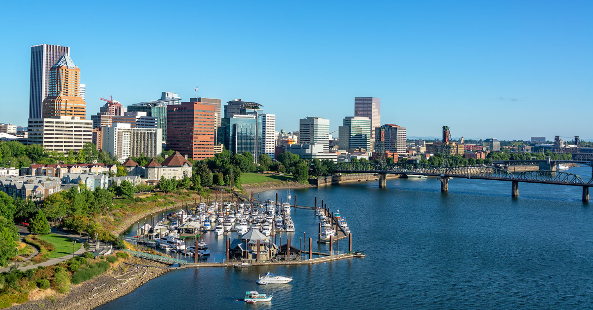 Photo of a day-time Portland cityscape overlooking the water